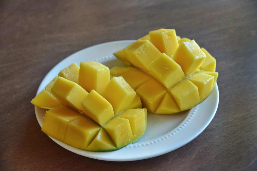 Easy sweet and spicy mango salsa. This salsa recipe is gluten-free, vegan-friendly and the perfect summer side dish to slay at your next cookout or BBQ. Learn how to tell when a mango is ripe and the trick to cutting a mango perfectly every time in this beginner friendly mango salsa recipe. reesewoods.com #reesewoodsfitness #mangosalsa #salsarecipe #bbqsidedish #tacotuesdayrecipe