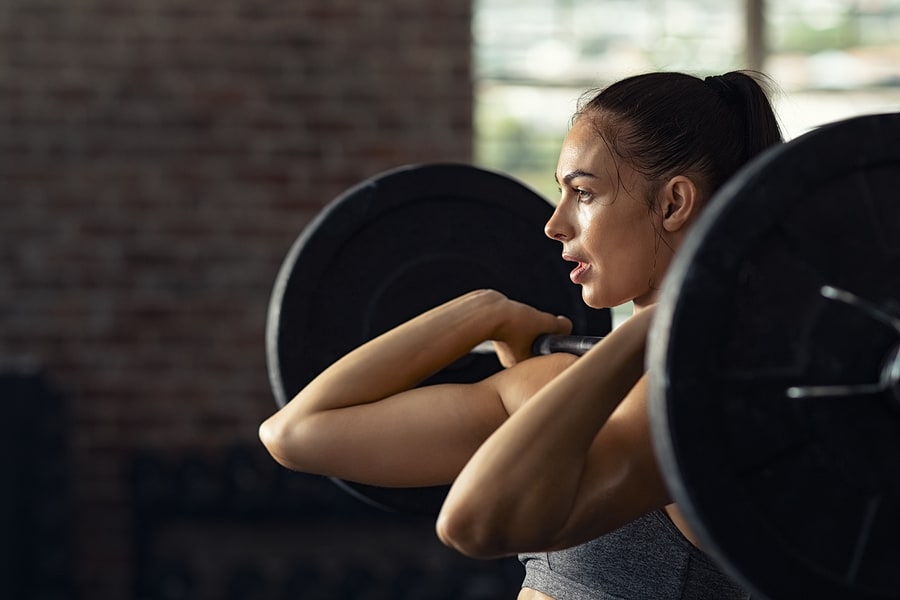 10 reasons for ladies to lift in 2020. Lifting weights boosts the metabolism, support weight loss and build muscles. Women who strength train also have better energy, better sleep and much more. Learn 10 reasons lifting weights should be one of your healthy New Year's resolutions. #weightlosstips #workouttips #reesewoodsfitness reesewoods.com
