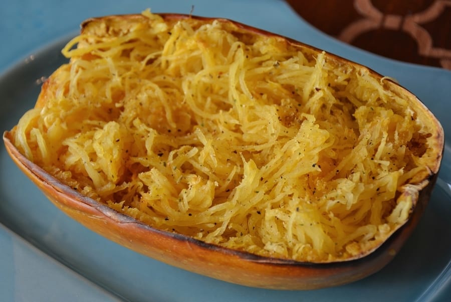 How to cook spaghetti squash (from reesewoods.com) This easy spaghetti squash recipe is gluten-free and vegan adaptable. Spaghetti squash is a healthy side dish and the perfect low-carb pasta substitute. Learn how to bake perfect spaghetti squash every time. #glutenfreerecipe #spaghettisquashrecipe #reesewoodsfitness reesewoods.com