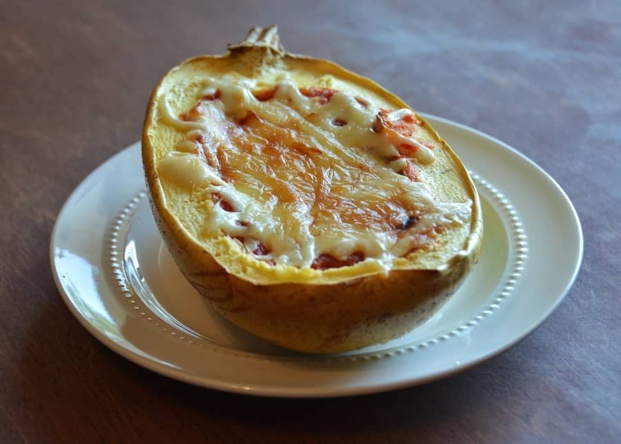How to cook spaghetti squash (from reesewoods.com) This easy spaghetti squash recipe is gluten-free and vegan adaptable. Spaghetti squash is a healthy side dish and the perfect low-carb pasta substitute. Learn how to bake perfect spaghetti squash every time. #glutenfreerecipe #spaghettisquashrecipe #reesewoodsfitness reesewoods.com