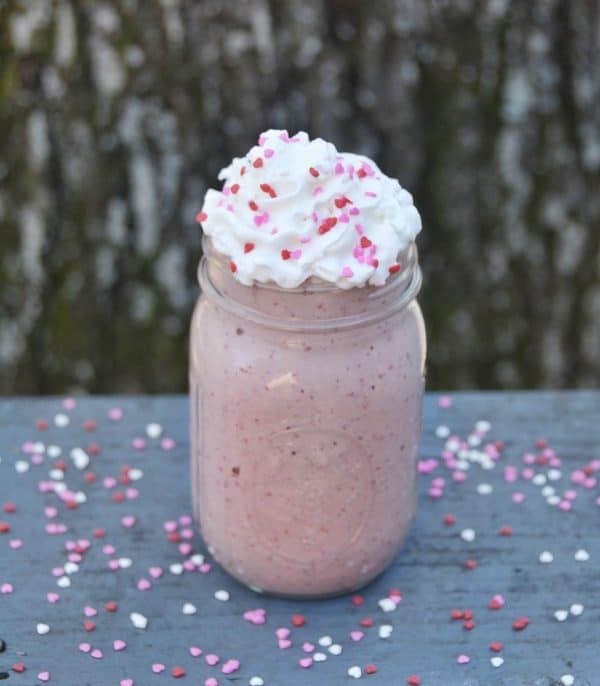 Chocolate covered strawberries smoothie recipe. This healthy Valentine's Day recipe will help satisfy your sweet tooth while keeping your weight loss goals on track. This protein smoothie serves as a full meal replacement shake and it delicious and nutritious. This smoothie recipe is vegan and vegetarian friendly. Gluten-free, keto, and kid-friendly recipe for the whole family. #valentinesdayrecipes #smoothierecipes #weightlossrecipes #reesewoodsfitness reesewoods.com